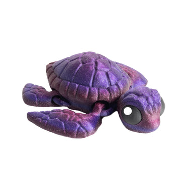 Piccola tartaruga – animaletto flexi stampato in 3D di colore viola glitter